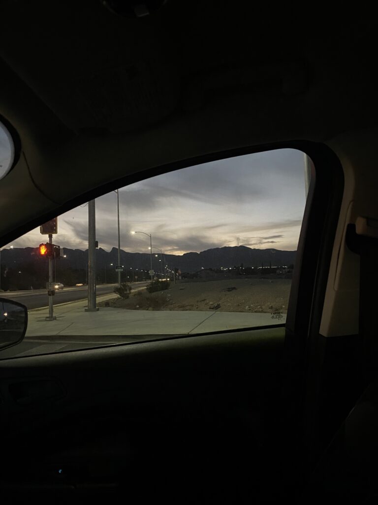 car window with sky at dusk