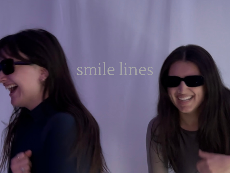 two girls laughing, smile lines